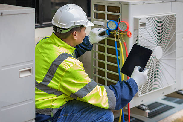 Professional Ac Installation technician working in Marengo, IA